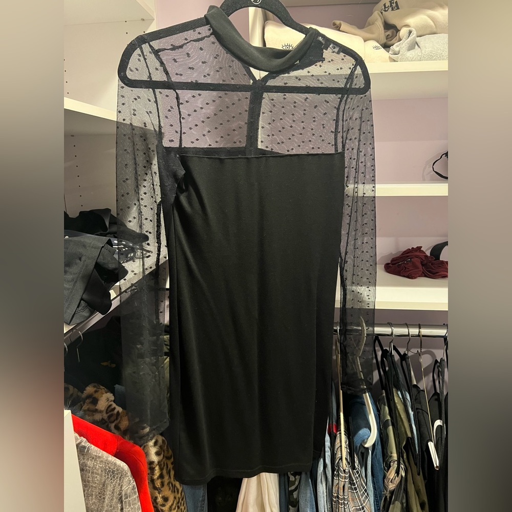 Black mini dress with polka dot lace sleeves and neck. Worn once! Size medium